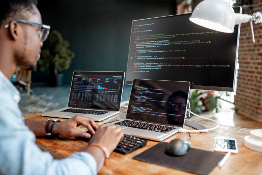 Programmer working with program code
